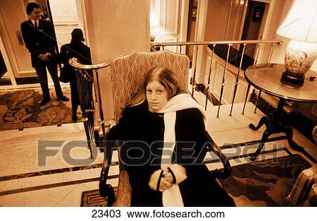 Young girl in lobby View Large Photo Image Stock Image - Young girl in lobby. Fotosearch