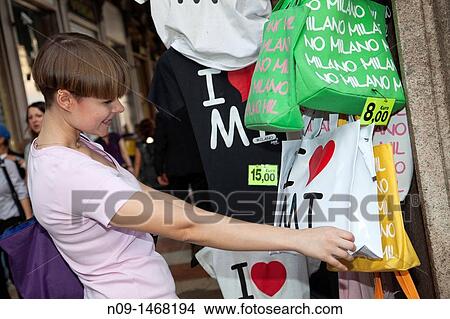 young girl in Piazza Duomo, Milan View Large Photo Image Picture - young girl in Piazza Duomo, Milan. Fotosearch