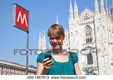 young girl in Piazza Duomo, Milan View Large Photo Image Stock Image - young girl in Piazza Duomo, Milan. Fotosearch