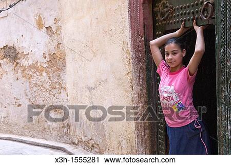 young girl in the medina, Fes, Morocco, North Africa View Large Photo Image Stock Image - young girl in the medina, Fes, Morocco, North Africa. Fotosearch