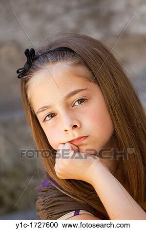 Young girl is depressed View Large Photo Image Stock Image - Young girl is depressed. Fotosearch