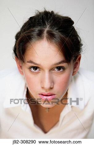 Young girl looking at camera. View Large Photo Image Stock Image - Young girl looking at camera.. Fotosearch