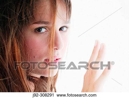 Young girl looking at camera. View Large Photo Image Stock Image - Young girl looking at camera.. Fotosearch
