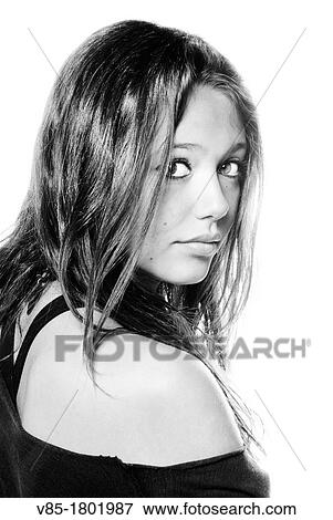 Young girl looking at camera View Large Photo Image Stock Photo - Young girl looking at camera. Fotosearch