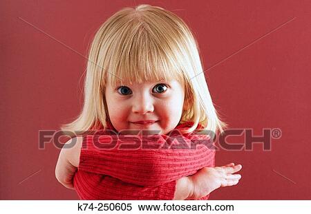 Stock Photography - Young Girl Looking At Camera. Fotosearch