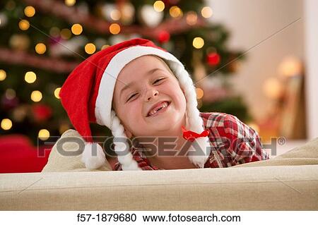 Young girl looking forward for Christmas View Large Photo Image Stock Image - Young girl looking forward for Christmas. Fotosearch