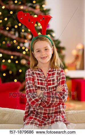 Young girl looking forward for Christmas View Large Photo Image Stock Photograph - Young girl looking forward for Christmas. Fotosearch