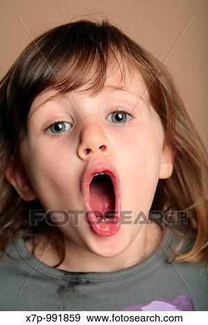 Young girl making faces View Large Photo Image Stock Photo - Young girl making faces. Fotosearch