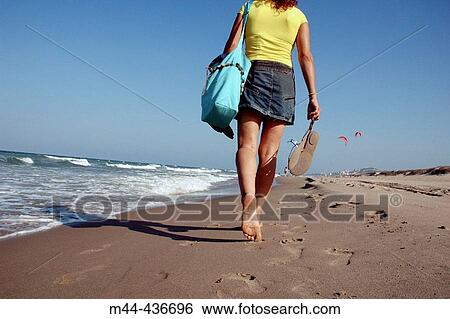 Young girl. Mareny Blau. Cullera. Valencia province. Spain. View Large Photo Image Stock Photograph - Young girl. Mareny Blau. Cullera. Valencia province. Spain.. Fotosearch