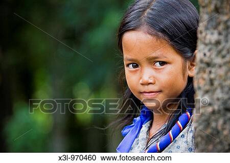 Young girl of Cambodia, Siam Reap, Angkor site View Large Photo Image Stock Image - Young girl of Cambodia, Siam Reap, Angkor site. Fotosearch