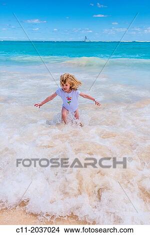 young girl on beach, Riu Palace, hotel, Punta Cana, Dominican Republic, Caribbean View Large Photo Image Picture - young girl on beach, Riu Palace, hotel, Punta Cana, Dominican Republic, Caribbean. Fotosearch