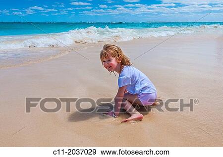 Stock Photo - young girl on beach, Riu Palace, hotel, Punta Cana, Dominican Republic, Caribbean. Fotosearch