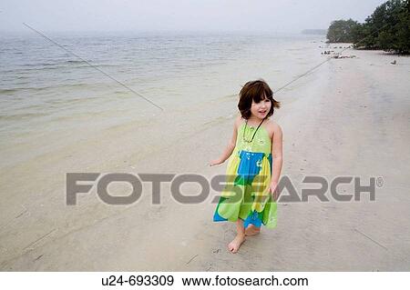 Young Girl on Beach View Large Photo Image Stock Photo - Young Girl on Beach. Fotosearch