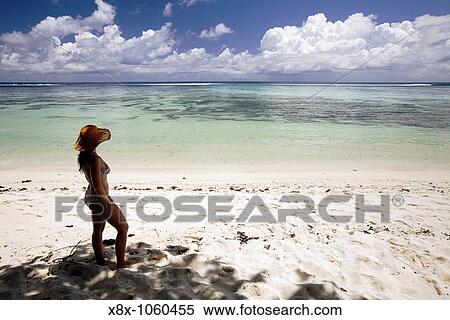 Young girl on the beach, La Digue Island, Seychelles View Large Photo Image Stock Photography - Young girl on the beach, La Digue Island, Seychelles. Fotosearch