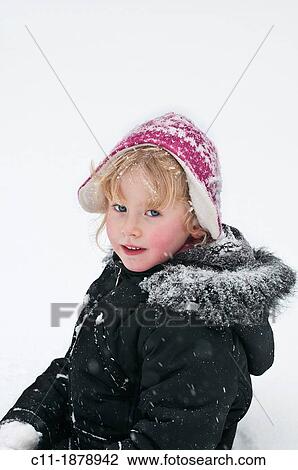 young girl playing in snow, biggin hill, london, england, uk, europe View Large Photo Image Stock Image - young girl playing in snow, biggin hill, london, england, uk, europe. Fotosearch