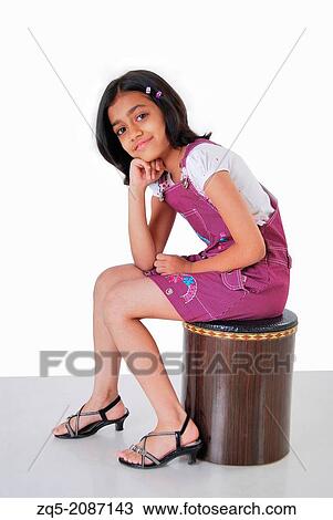 Young girl posing as a model, Pune, India. View Large Photo Image Stock Image - Young girl posing as a model, Pune, India.. Fotosearch