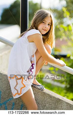 Stock Photograph - Young girl posing. Fotosearch