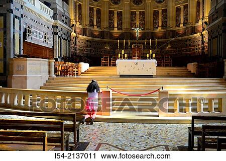 Young Girl Praying Kneeling National Shrine of St. Therese Lisieux France Little Flower Basilica Church Europe. View Large Photo Image Stock Image - Young Girl Praying Kneeling National Shrine of St. Therese Lisieux France Little Flower Basilica Church Europe.. Fotosearch