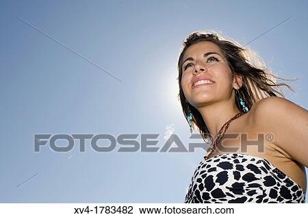 Young girl relaxed with bikini at lake in summertime View Large Photo Image Stock Image - Young girl relaxed with bikini at lake in summertime. Fotosearch