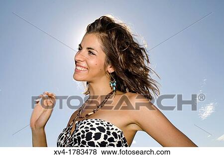 Young girl relaxed with bikini at lake in summertime View Large Photo Image Stock Photo - Young girl relaxed with bikini at lake in summertime. Fotosearch