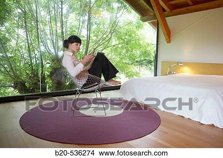 Young girl relaxing in a Villa at Aranzazu, Aizkorri Natural Park, near Oati. Gipuzkoa, Basque Country, Spain View Large Photo Image Picture - Young girl relaxing in a Villa at Aranzazu, Aizkorri Natural Park, near Oati. Gipuzkoa, Basque Country, Spain. Fotosearch