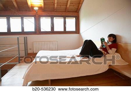 Young girl relaxing in a Villa at Aranzazu, Aizkorri Natural Park, near Oati. Gipuzkoa, Basque Country, Spain View Large Photo Image Stock Image - Young girl relaxing in a Villa at Aranzazu, Aizkorri Natural Park, near Oati. Gipuzkoa, Basque Country, Spain. Fotosearch