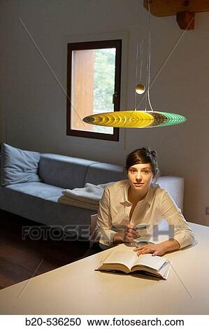 Stock Image - Young girl relaxing in a Villa at Aranzazu, Aizkorri Natural Park, near Oati. Gipuzkoa, Basque Country, Spain. Fotosearch