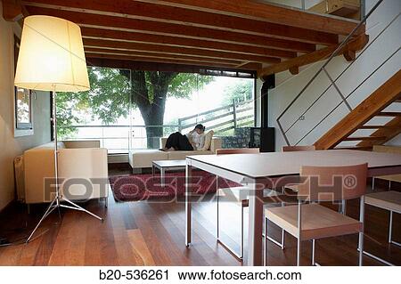 Stock Image - Young girl relaxing in a Villa at Aranzazu, Aizkorri Natural Park, near Oati. Gipuzkoa, Basque Country, Spain. Fotosearch
