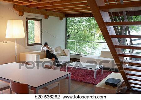 Young girl relaxing in a Villa at Aranzazu, Aizkorri Natural Park, near Oati. Gipuzkoa, Basque Country, Spain View Large Photo Image Stock Image - Young girl relaxing in a Villa at Aranzazu, Aizkorri Natural Park, near Oati. Gipuzkoa, Basque Country, Spain. Fotosearch