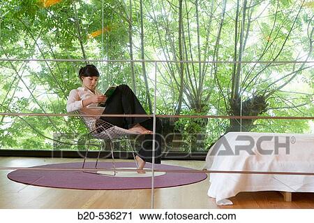Young girl relaxing in a Villa at Aranzazu, Aizkorri Natural Park, near Oati. Gipuzkoa, Basque Country, Spain View Large Photo Image Stock Image - Young girl relaxing in a Villa at Aranzazu, Aizkorri Natural Park, near Oati. Gipuzkoa, Basque Country, Spain. Fotosearch
