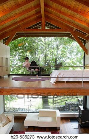 Young girl relaxing in a Villa at Aranzazu, Aizkorri Natural Park, near Oati. Gipuzkoa, Basque Country, Spain View Large Photo Image Stock Image - Young girl relaxing in a Villa at Aranzazu, Aizkorri Natural Park, near Oati. Gipuzkoa, Basque Country, Spain. Fotosearch