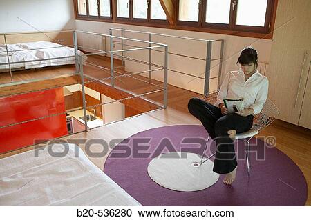 Young girl relaxing in a Villa at Aranzazu, Aizkorri Natural Park, near Oati. Gipuzkoa, Basque Country, Spain View Large Photo Image Stock Image - Young girl relaxing in a Villa at Aranzazu, Aizkorri Natural Park, near Oati. Gipuzkoa, Basque Country, Spain. Fotosearch