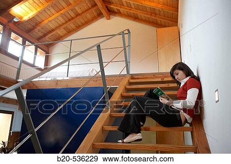 Young girl relaxing in a Villa at Aranzazu, Aizkorri Natural Park, near Oati. Gipuzkoa, Basque Country, Spain View Large Photo Image Stock Photo - Young girl relaxing in a Villa at Aranzazu, Aizkorri Natural Park, near Oati. Gipuzkoa, Basque Country, Spain. Fotosearch
