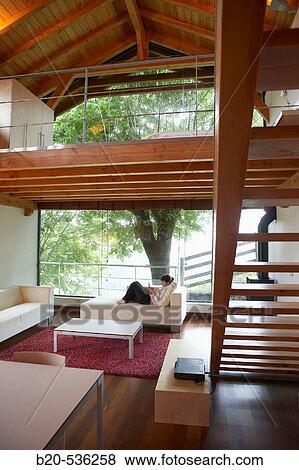 Stock Photo - Young girl relaxing in a Villa at Aranzazu, Aizkorri Natural Park, near Oati. Gipuzkoa, Basque Country, Spain. Fotosearch