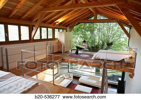 Young girl relaxing in a Villa at Aranzazu, Aizkorri Natural Park, near Oati. Gipuzkoa, Basque Country, Spain View Large Photo Image Stock Photo - Young girl relaxing in a Villa at Aranzazu, Aizkorri Natural Park, near Oati. Gipuzkoa, Basque Country, Spain. Fotosearch