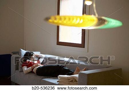 Young girl relaxing in a Villa at Aranzazu, Aizkorri Natural Park, near Oati. Gipuzkoa, Basque Country, Spain View Large Photo Image Stock Photograph - Young girl relaxing in a Villa at Aranzazu, Aizkorri Natural Park, near Oati. Gipuzkoa, Basque Country, Spain. Fotosearch