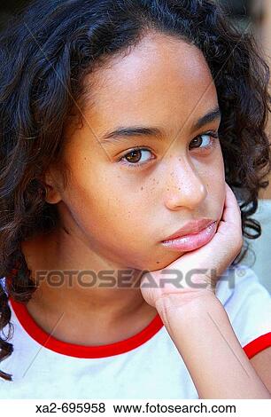 young girl resting head on palm View Large Photo Image Stock Photo - young girl resting head on palm. Fotosearch