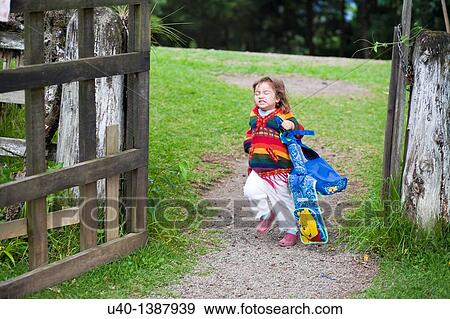 Young girl running View Large Photo Image Stock Photo - Young girl running. Fotosearch