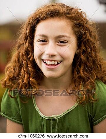 Young girl smiling and laughing Mixed race, Mexican and caucasian View Large Photo Image Stock Photograph - Young girl smiling and laughing Mixed race, Mexican and caucasian. Fotosearch