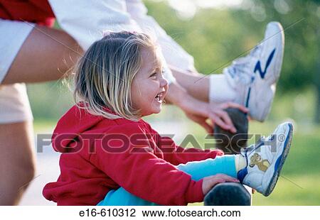 Young girl stretching View Large Photo Image Stock Image - Young girl stretching. Fotosearch