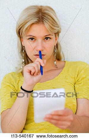 Young girl taking notes View Large Photo Image Stock Photo - Young girl taking notes. Fotosearch