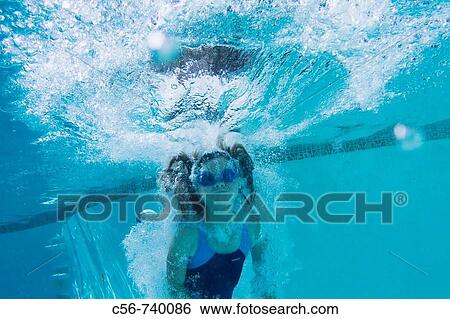 Young girl underwater View Large Photo Image Stock Photograph - Young girl underwater. Fotosearch