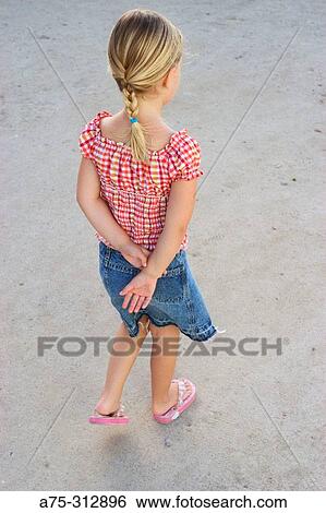 Stock Photograph - young girl walking. Fotosearch