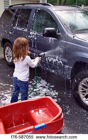Young girl washing the family car. View Large Photo Image Stock Photography - Young girl washing the family car.. Fotosearch