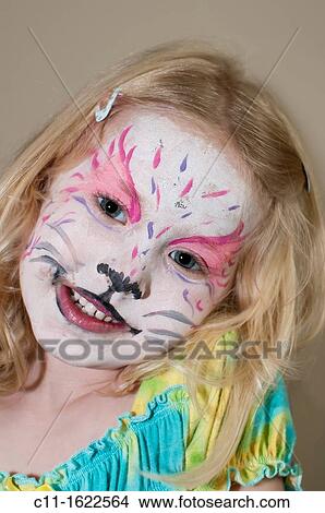 young girl wearing face paint on holiday, caribbean View Large Photo Image Picture - young girl wearing face paint on holiday, caribbean. Fotosearch