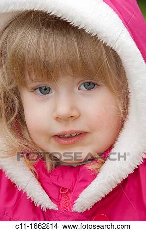 young girl wearing pink coat View Large Photo Image Picture - young girl wearing pink coat. Fotosearch