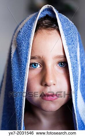 Young girl with a towel around her head after a shower. View Large Photo Image Stock Photograph - Young girl with a towel around her head after a shower.. Fotosearch