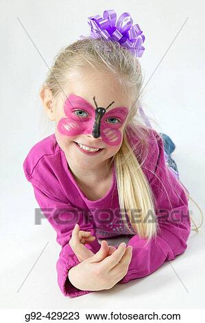 Young girl with bodypaint, butterfly painted in face. View Large Photo Image Stock Image - Young girl with bodypaint, butterfly painted in face.. Fotosearch