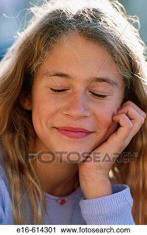 young girl with eyes closed View Large Photo Image Stock Image - young girl with eyes closed. Fotosearch