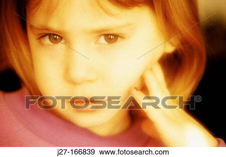 Young girl with lipstick trying to look grown-up View Large Photo Image Stock Photo - Young girl with lipstick trying to look grown-up. Fotosearch